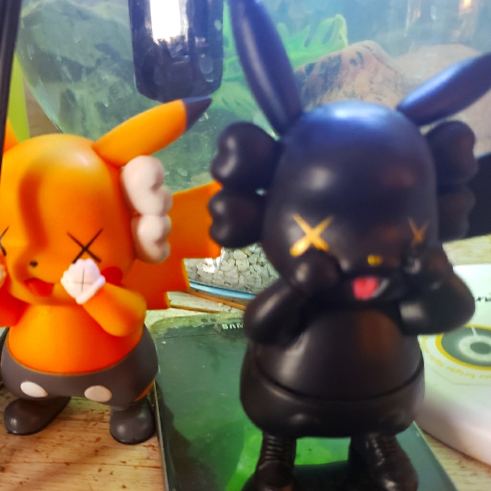 KAWS gloomy bear Pikachu collab